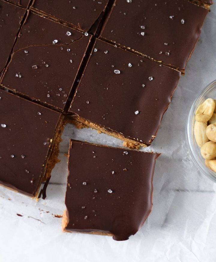 These gluten-free, vegan, and paleo no-bake chocolate almond butter bars are creamy, salty, and subtly sweet. The perfect make-ahead dessert for your next event - these are sure to be a crowd pleaser!