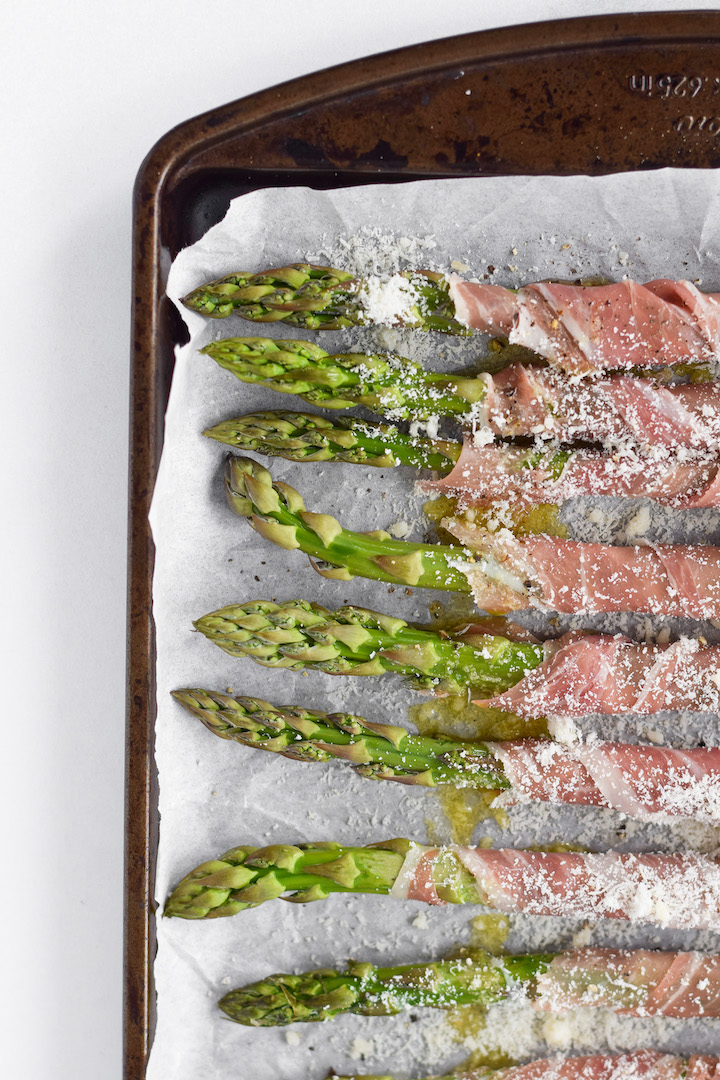This prosciutto wrapped asparagus is the perfect summer side! It's crispy, salty, delicious, and gluten-free.