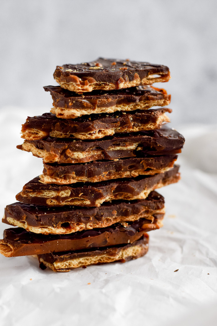 This Gluten-Free Christmas Crack is seriously addicting! Made with layers of saltine crackers, caramel, and chocolate, this healthier version is also dairy-free and vegan.
