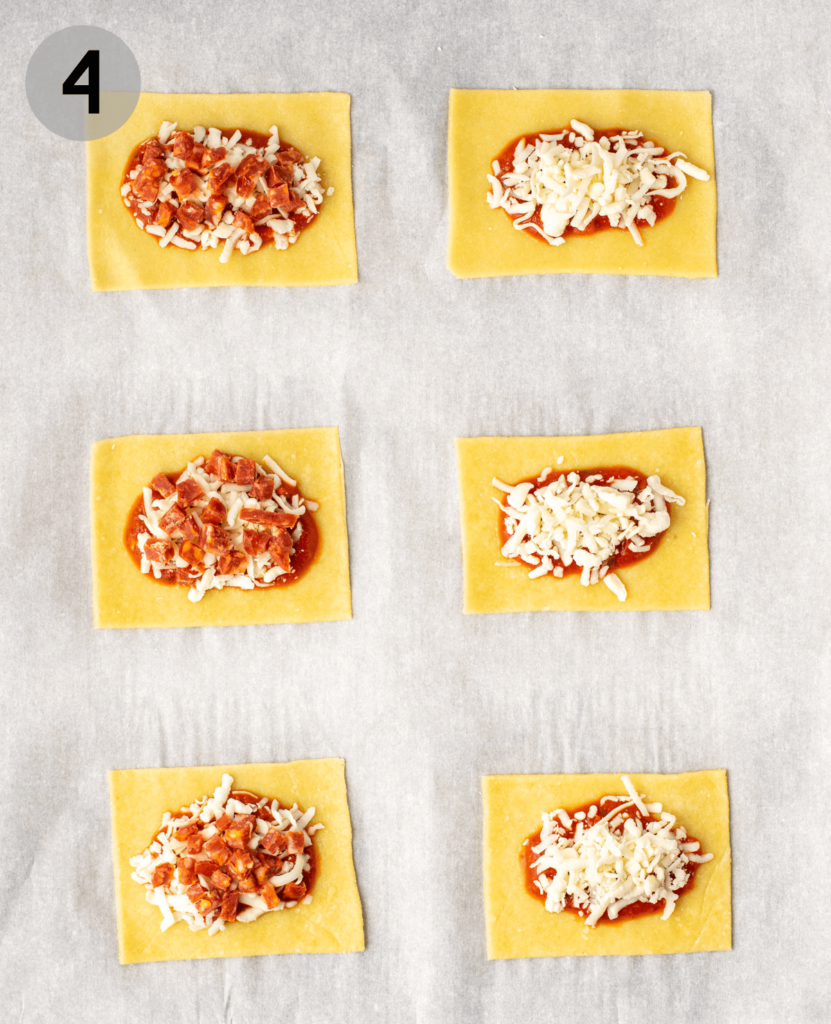 6 pieces of pizza pocket dough filled with sauce and cheese