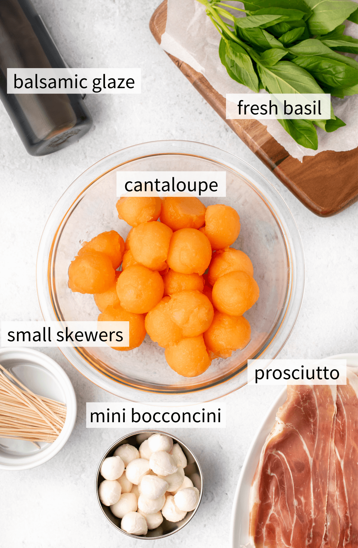 ingredients to make melon and prosciutto skewers