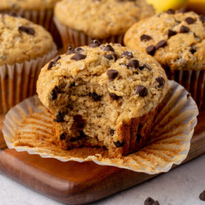banana chocolate chip muffin with a bite missing.