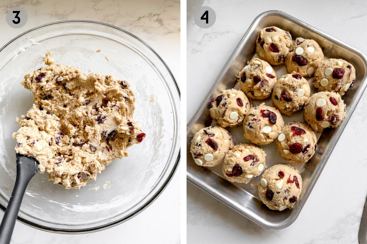 gluten free white chocolate cranberry cookie dough rolled into balls on a metal tray.