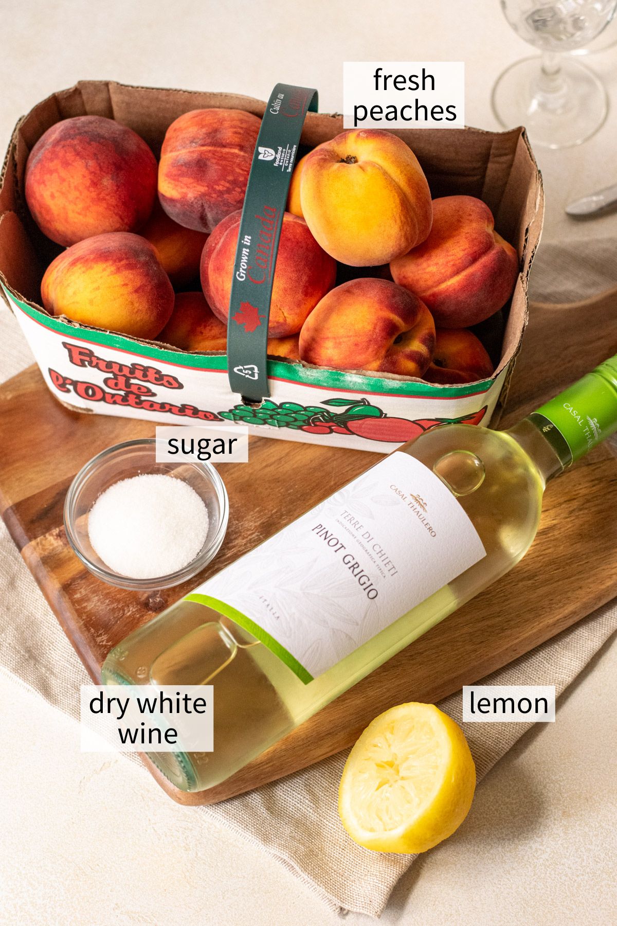 ingredients to make Italian peaches in wine.