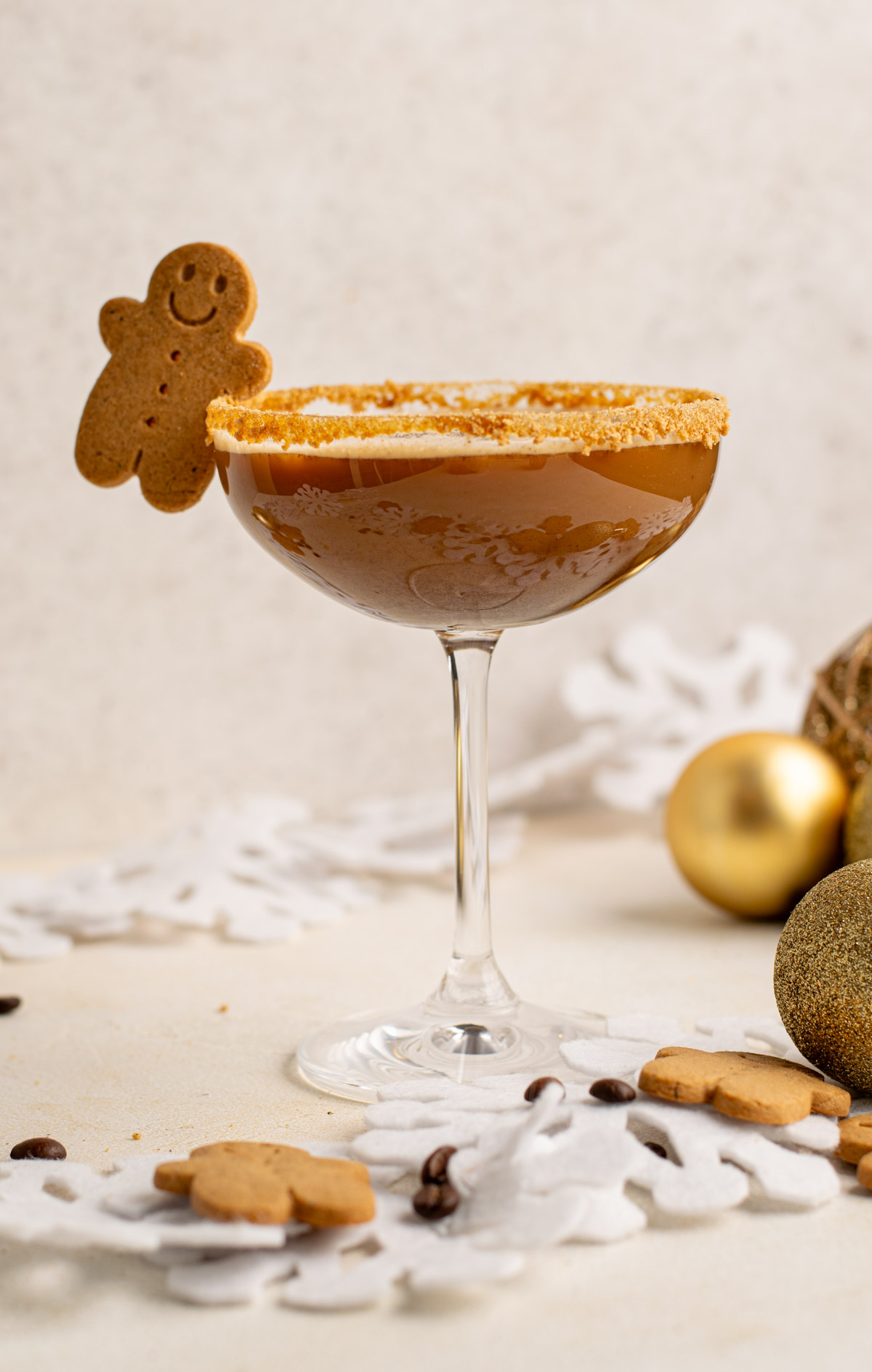 side view of a gingerbread martini in a coupe glass.
