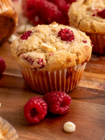 close up of a raspberry white chocolate muffin.
