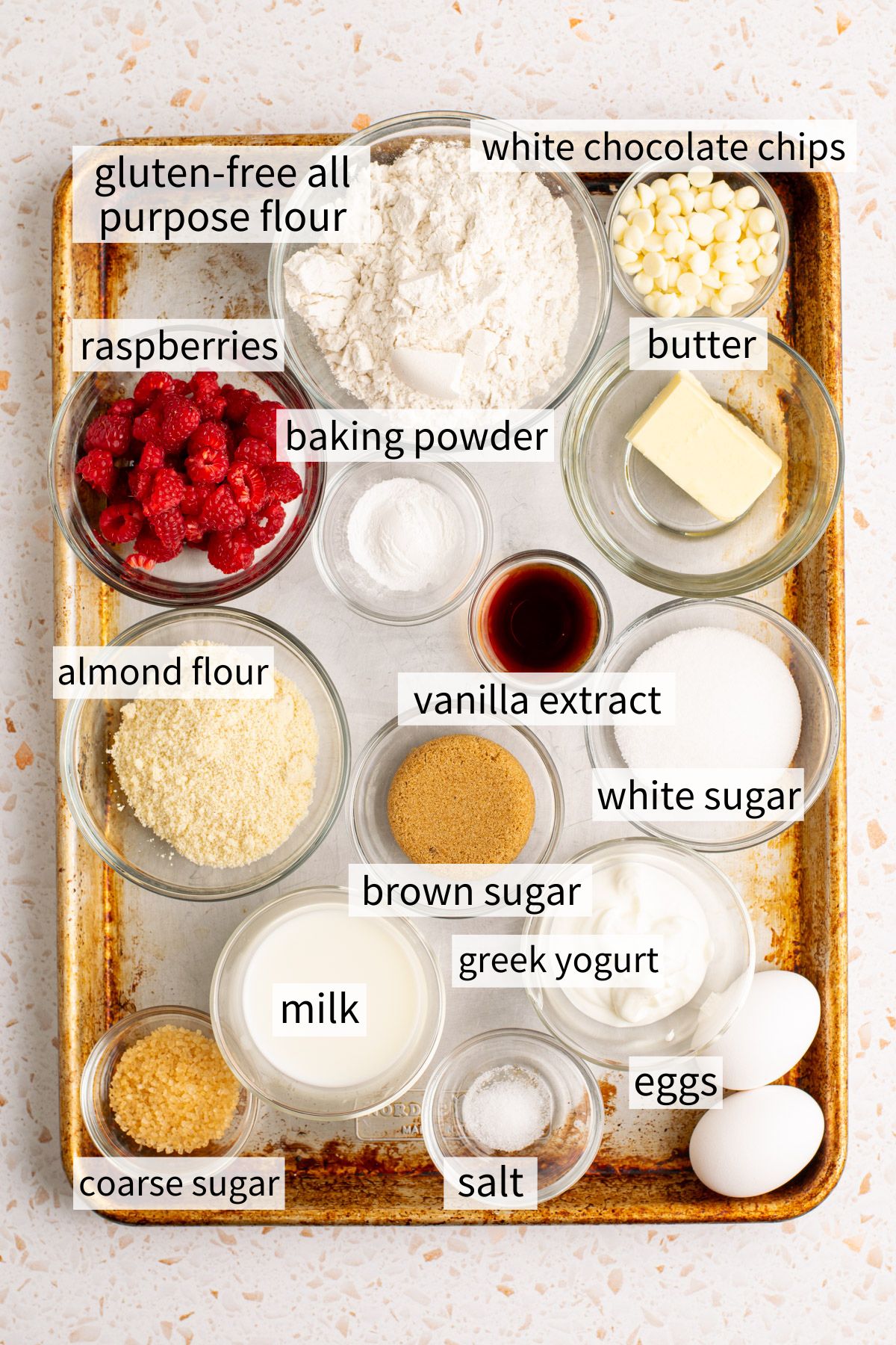 ingredients to make gluten free white chocolate raspberry muffins.