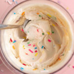 spoon in a pint of cake batter protein ice cream.