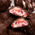 close up of chocolate covered yogurt berry clusters.