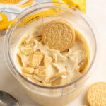 close up of golden oreos on top of protein ice cream in a ninja creami pint.