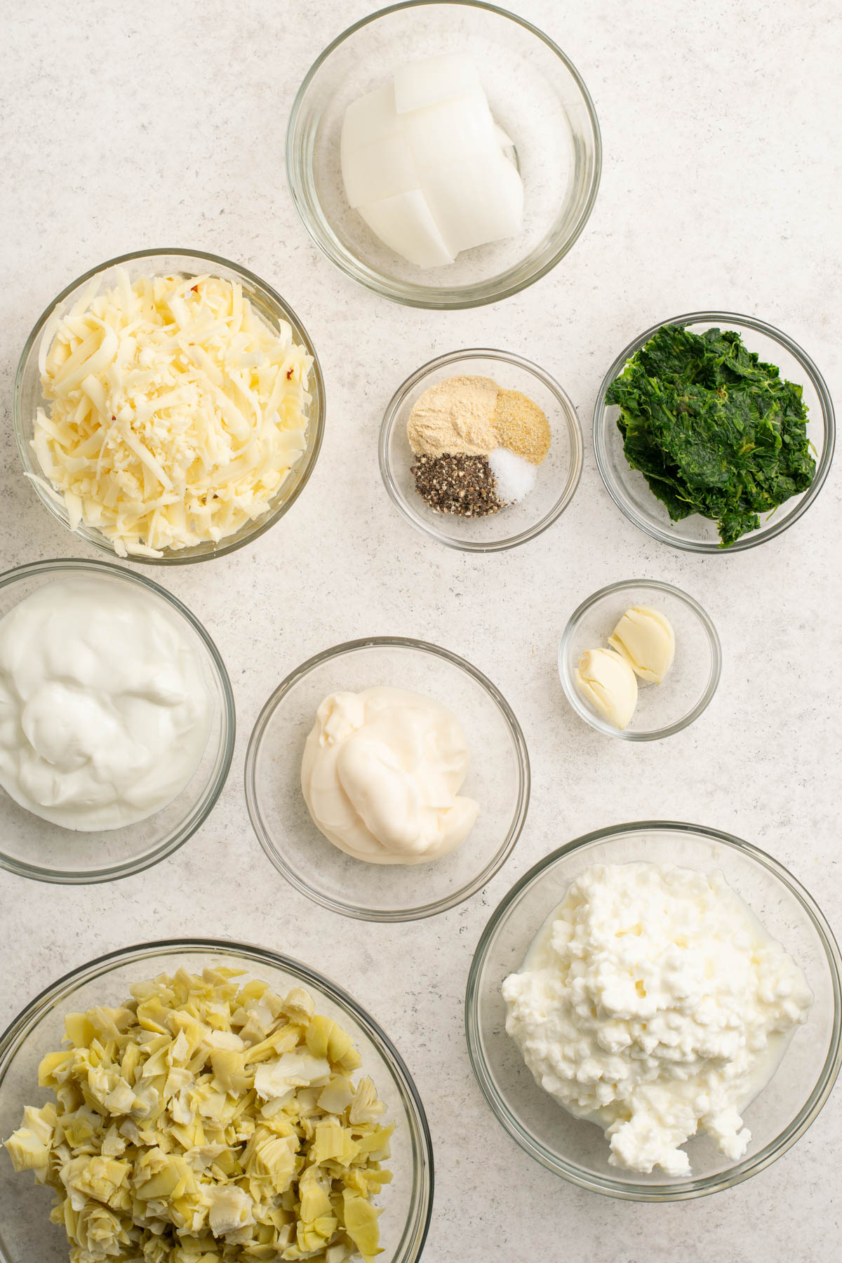 ingredients to make high protein spinach and artichoke dip.